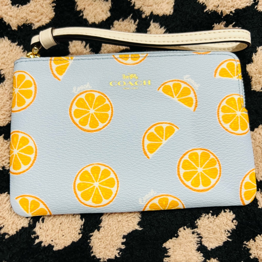 Coach orange slice wristlet! Brand new with tags.
